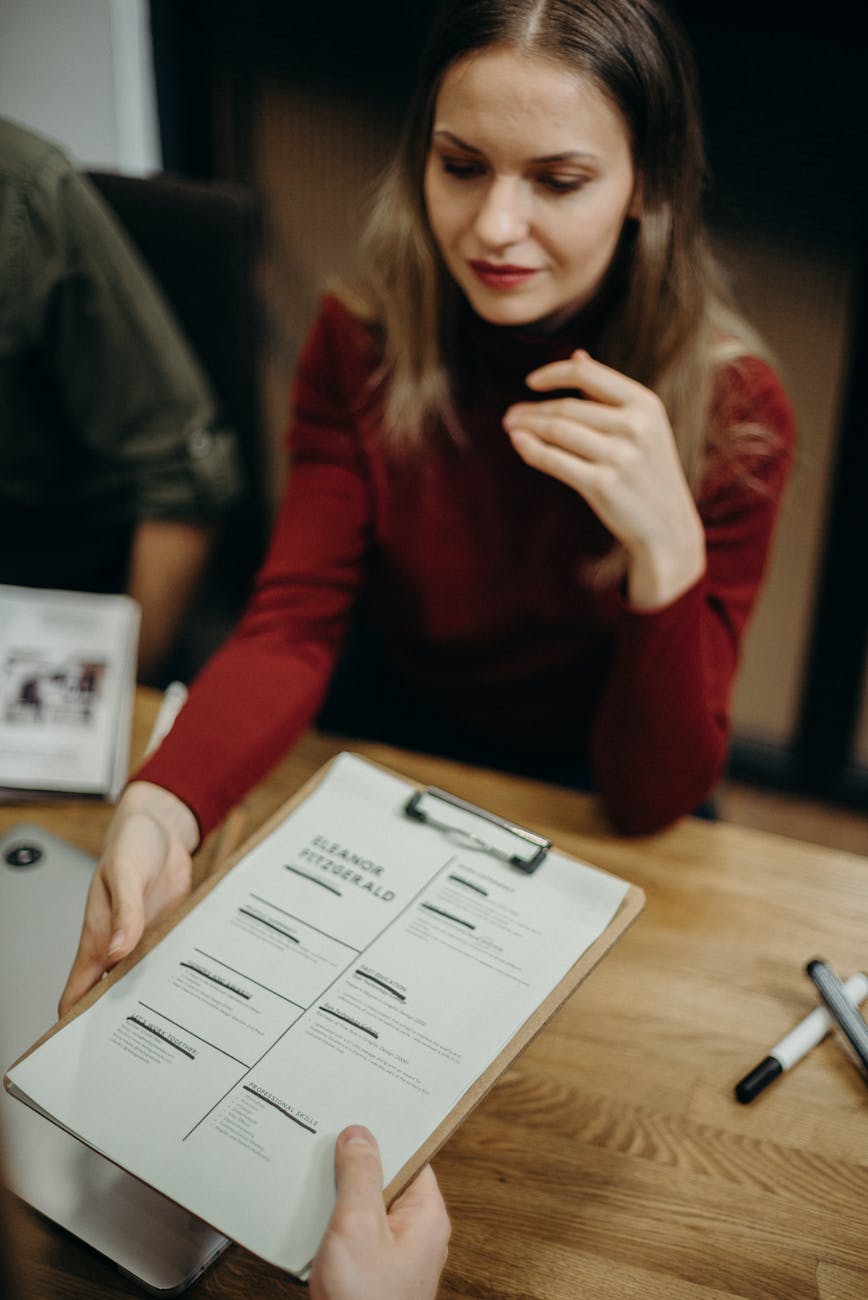 woman holding clipboard