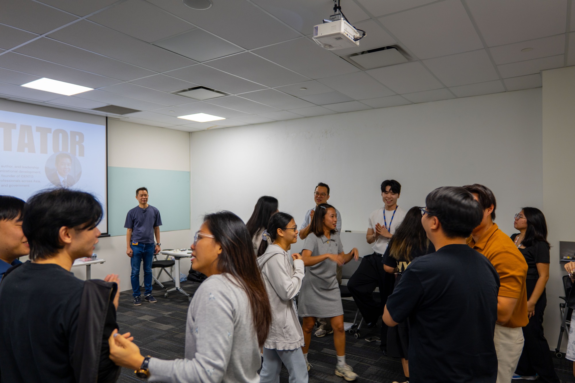 YSG participants taking part in an office team building briefing.
