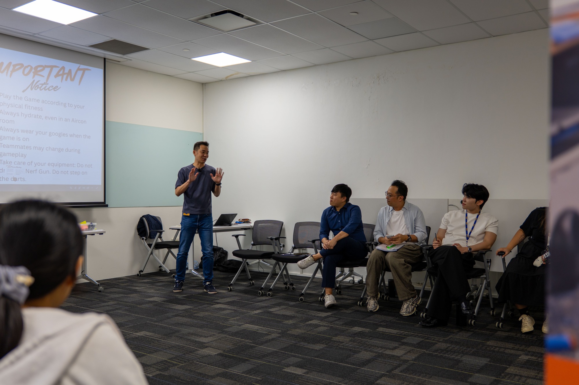A facilitator leading a discussion with YSG participants.